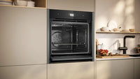 Neff N90 Slide and Hide B64CS71G0B Built-In Electric Single Oven, Graphite Grey with Pyrolytic Cleaning, A+ Rated